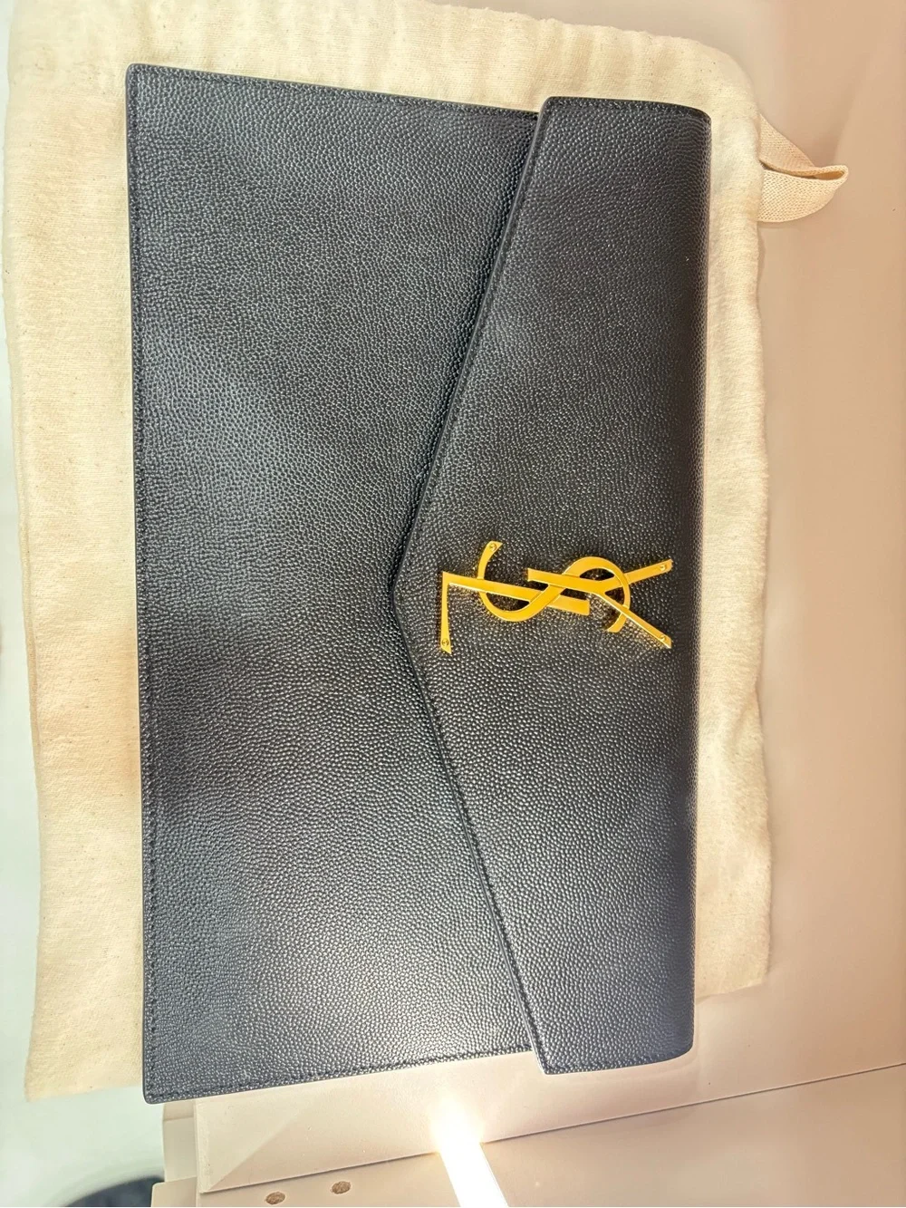 Saint Laurent Black Envelope Clutch retails now for 800$